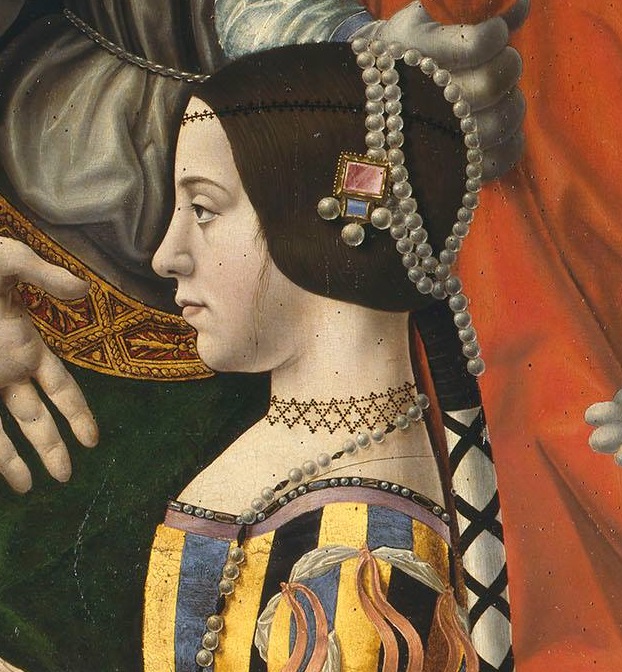 Portrait of Beatrice d'Este, a detail from the same painting of the ducal couple kneeling among their patron saints. She wears pearls in her hair, a costly brooch, and a gown of bold gold and black striped silk.