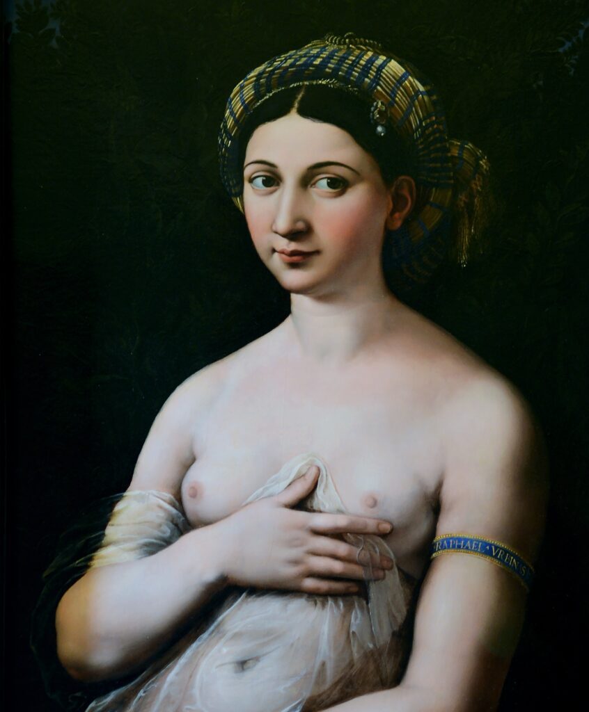 Raphael's portrait of his beloved Margherita Luti. She wears a beautiful silk scarf and has a translucent drape which she holds below and between her breasts which are delicately bare. Her eyes and hair are very dark, and her expression sweet.