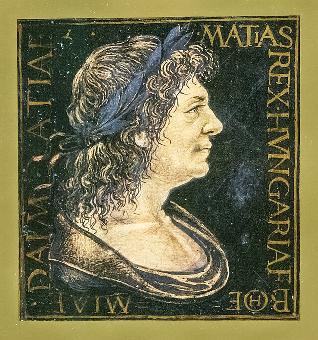 Illuminated manuscript small portrait of Matthias, still in profile, crowned with laurels just like a Roman Emperor.