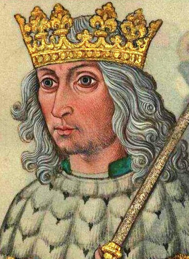 Portrait illumination of Vladislaus II of Hungary. He wears a regal crown, a mantle of white ermine fir, and holds a scepter. His hair flows down to his shoulders in regal silver curls.